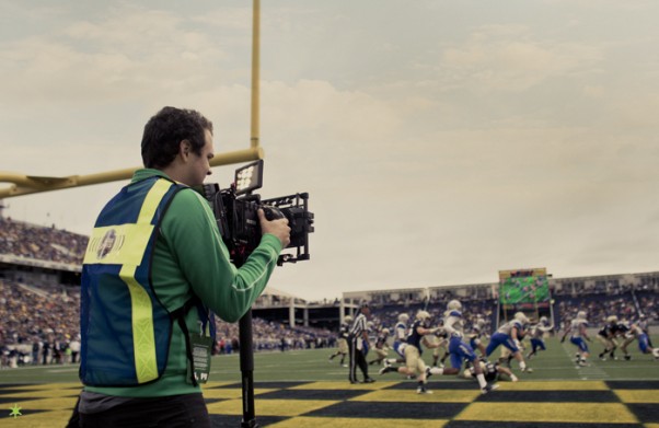 P. shooting the navy vs. airforce game with the epic. and what a great, nail biting game that was. a big thanks to steve and jens at zacuto for helping P. build a custom EPIC rig that would run on a monopod.